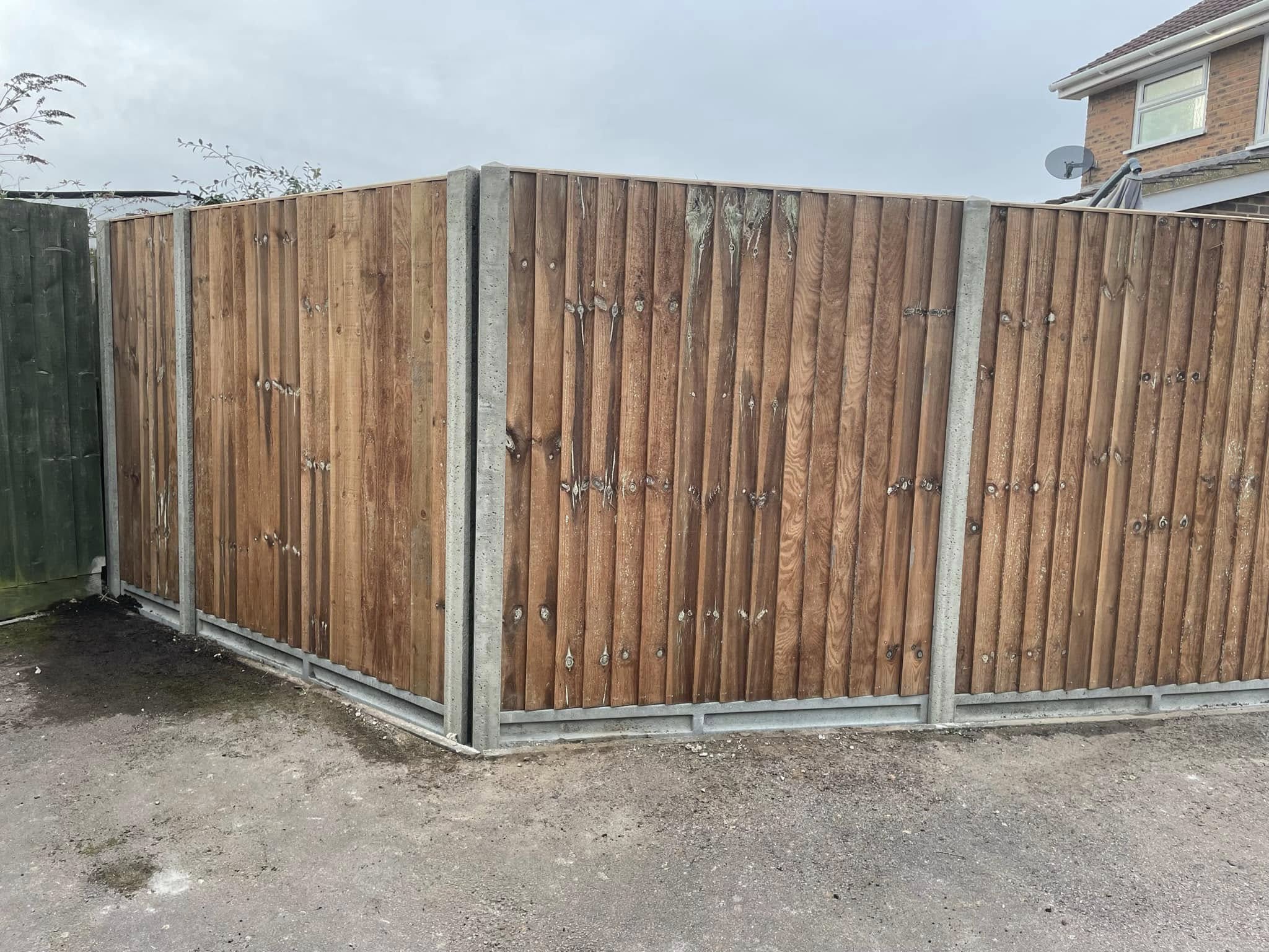 Wooden fencing in a residential garden installations