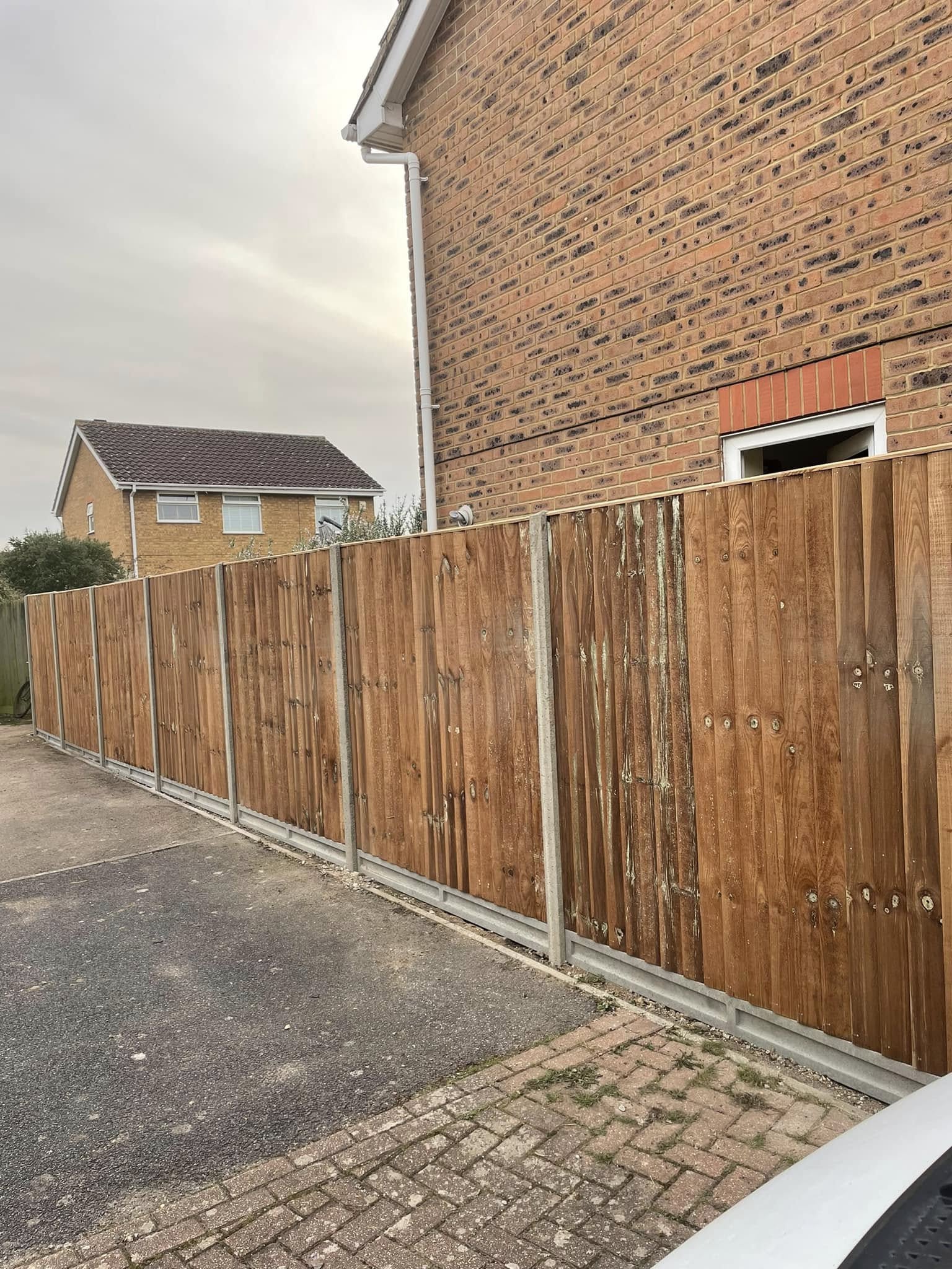 Strong closeboard fence surrounding a family garden